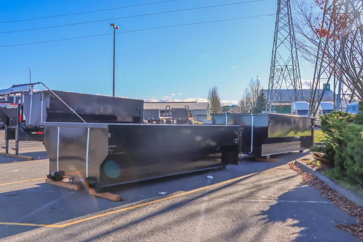 Roll-off dumpster ready for waste disposal at job site for 6 Yard Dumpster Rental in Vernon